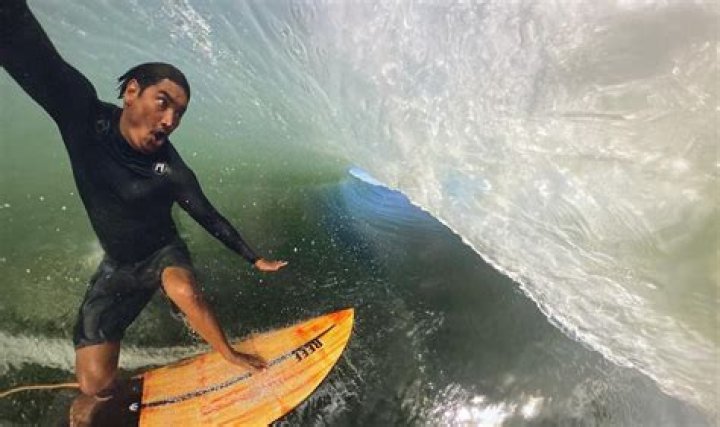 Pro Surfer Mikala Jones Had a Wife and Kids &mdash; Meet His Family